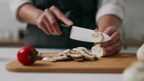 Cook Woman Cuts Mushrooms Edible Spore Mushrooms For Cooking Delicious Fast Food Restaurant Food