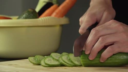 Cucumber Slicing on Board for Healthy Cooking