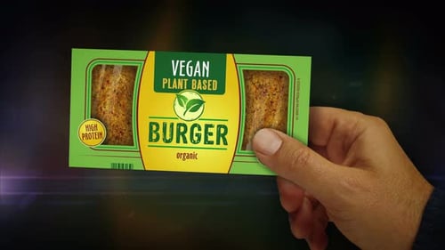 Vegan burger green organic food pack in hand abstract concept