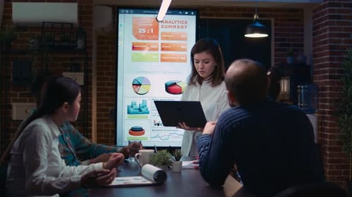 Business Team Analyzing Data in Modern Office