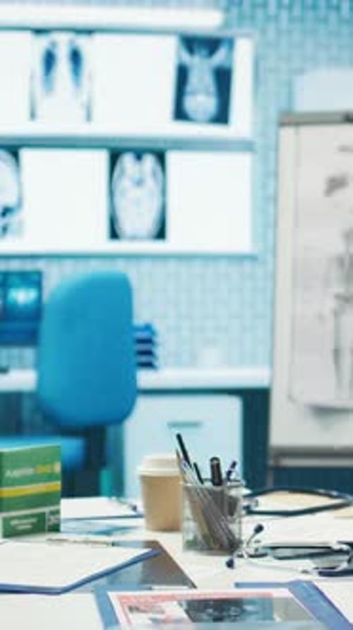 Doctor's Office Desk with Medical Equipment and X-rays