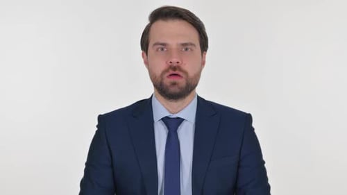 Middle Aged Businessman Reacting to Failure on White Background