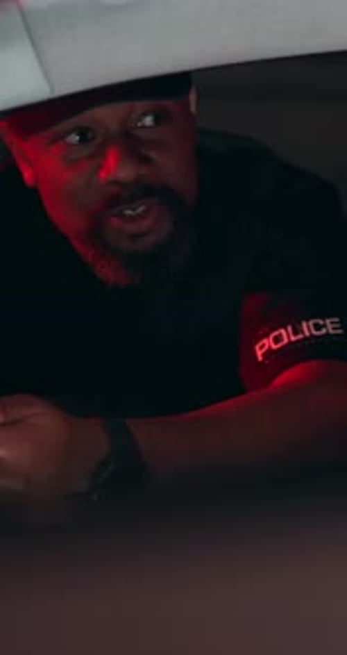 Police officer, car and night with man and stop for drunk driving, speeding and investigation