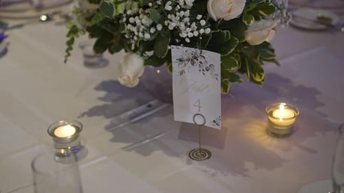 Elegant Wedding Table Setting with Floral Centerpiece