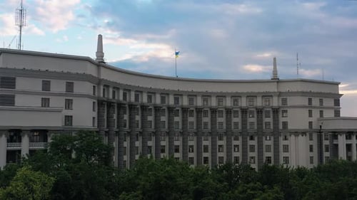 Aerial View of a Building with a Flag
