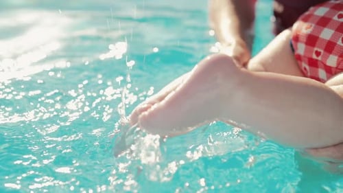 Newborn Baby Girl Swimming in Pool with Her Mother or Coach Educational Lessons in School for