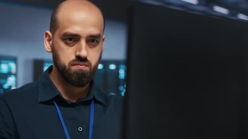 IT Worker Coding Complex Data Center Operations