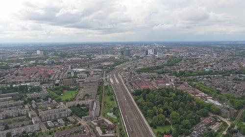 Aerial panorama of Dutch train on railway lines through Utrecht city