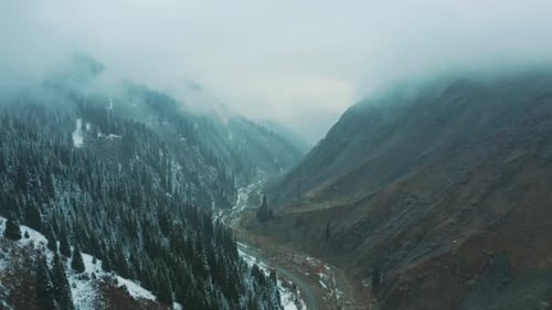 The Road To The Gorge. Snowing