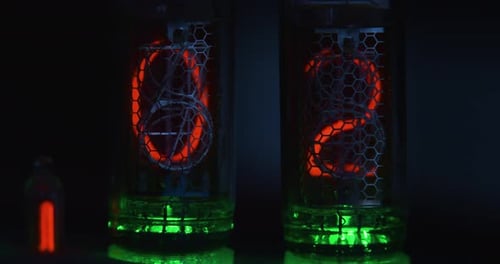 A Retro Tube Stopwatch Counts Seconds on a Glowing Acid Green Base