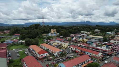 Aerial drone of a city in Kota Belud Sabah Malaysia lock track left shot