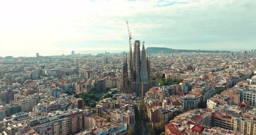 Aerial View of Sagrada Familia and Barcelona Cityscape