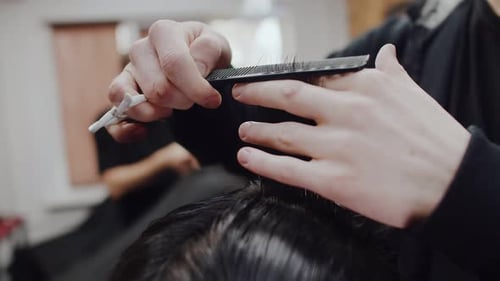 Barber Cuts Wet Hair Close Up