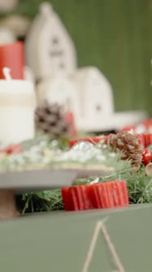 Vertical video. Christmas market, handmade crafts, candles of various shapes.