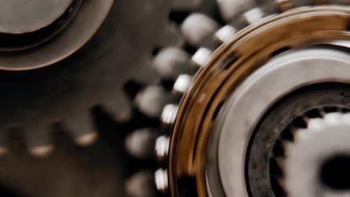 two engine gears starting to move together (close up)