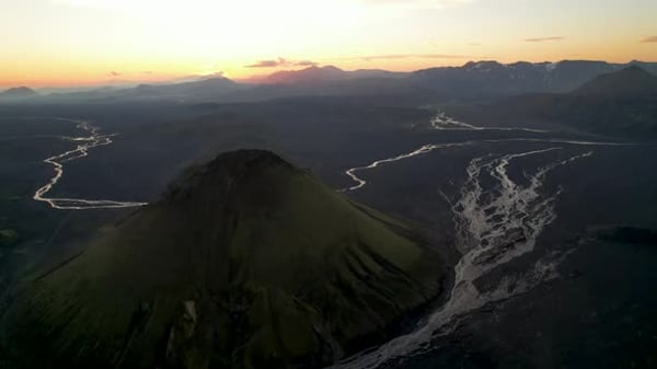 Aerial View Of Maelifell Volcano And Icelandic Landscape At Sunset aerial-view-of-maelifell-volcano-and-icelandic-landscape-at-sunset