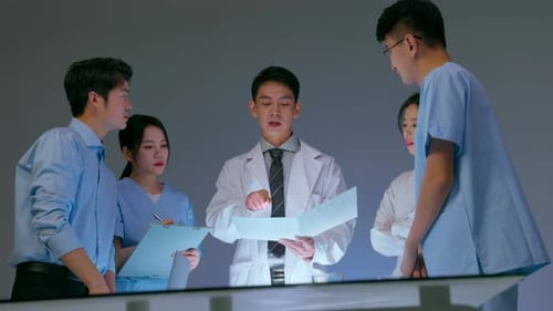 Professional Clinic therapist talking with colleagues about disease Team experts medical having meet