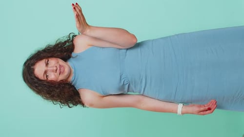 Woman Posing in a Blue Dress