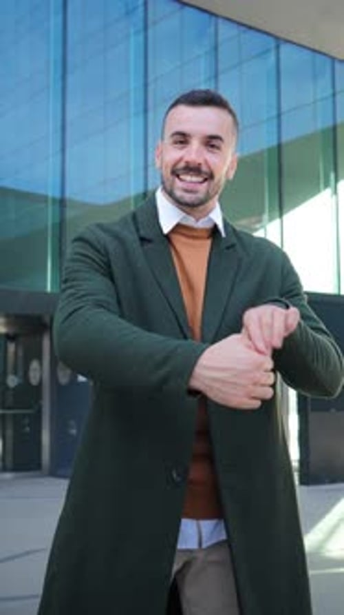 Vertical Portrait of Arms Crossed Young Adult Man with Friendly and Positive Expression Front View
