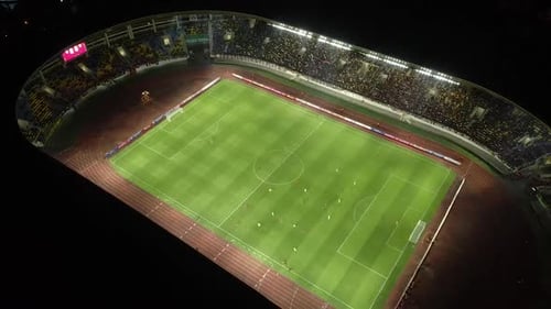 Aerial night football stadium in Solo City Central Java, Indonesia.