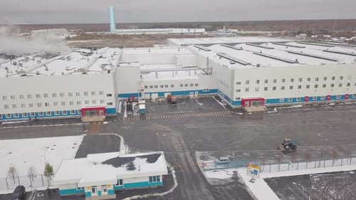 Aerial View of a Large Logistics Park with a Warehouse Creative Flying Above a Large Logistics or