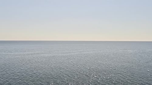 Sea Water Surface Aerial View Over Clear Azure Sea Water Sun Glare Abstract Nautical Summer Ocean