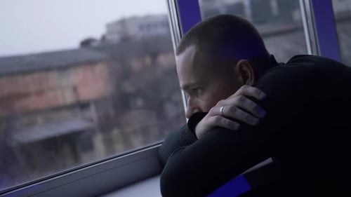 Sad Guy Looking Window