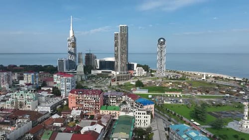 Aerial view of Batumi university and Alphabetic tower, skyscrapers and embankment of Batumi city