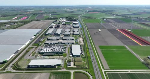 Large scale data center, bits and bytes, server space, cloud services, building exterior.