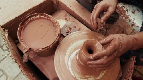 Shaping A Clay Pot In A Ceramics Workshop 47