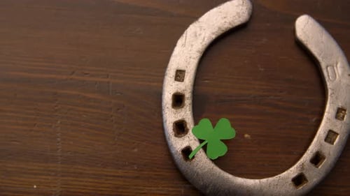 Holidays and St Patrick'S Day Concept - Horseshoe with Shamrock on Wooden