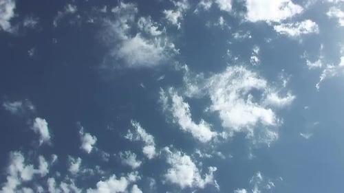 Clouds Flowing Across a Deep Blue Sky