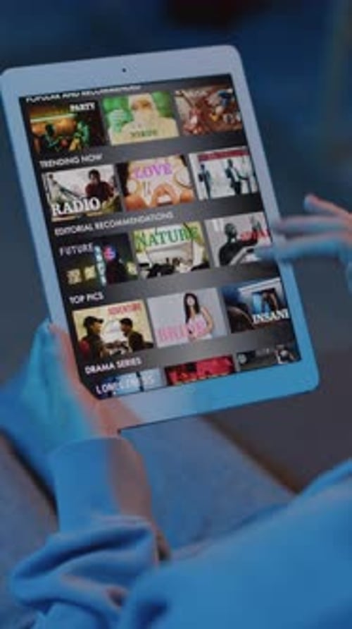 Woman Choosing Film to Watch on Stream Service