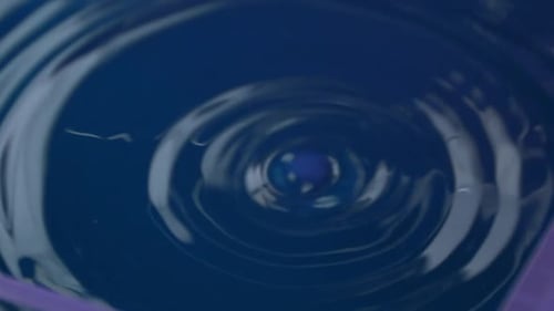 Close up water droplet. High definition shot of water droplet. A water drop is a small amount of liq