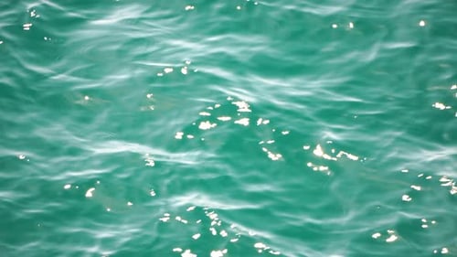 Sea Water Surface Aerial View on Clear Azure Sea Water Sun Glare Abstract Nautical Summer Ocean