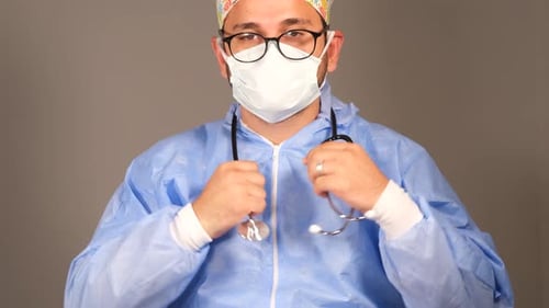Doctor Puts Stethoscope Around His Neck