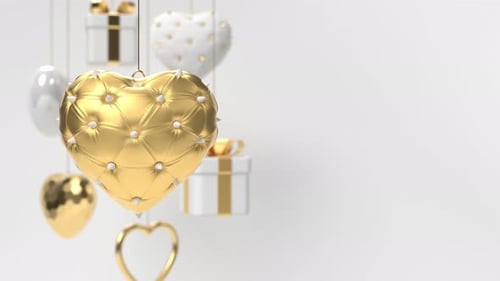 Rotating golden 3d hearts decorated spikes.