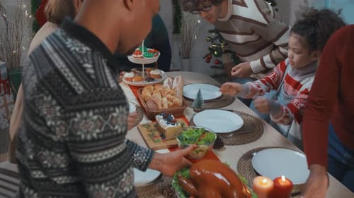 Friends and Family Gathering for Christmas Dinner