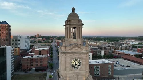 Polk County Courthouse in downtown Des Moines, Iowa. Aerial orbit at sunset. State capitol building