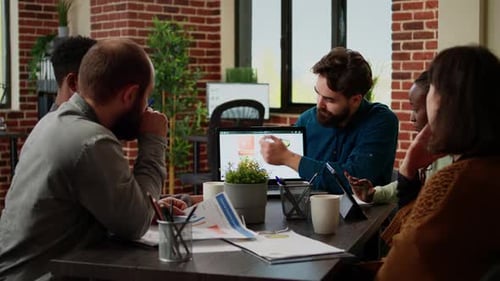 Diverse Team Collaborating in Modern Office Space