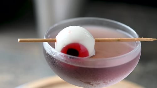 Halloween Cocktail with Lychee Eyeball Garnish Close Up