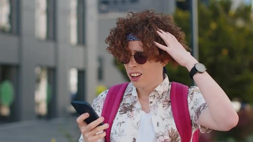 Confused Puzzled Tourist Man in Sunglasses Talking on Smartphone Disconnect Prank Upset Unhappy