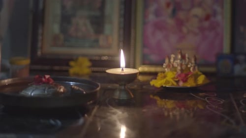 Religious Items on a Table at Night