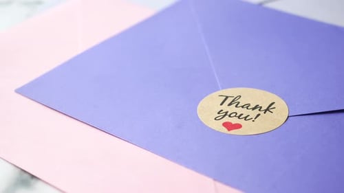 Thank You Notes with Heart Sticker on Marble