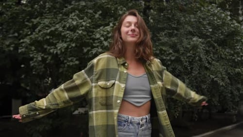 Beautiful attractive young girl woman looking at the camera and laugh