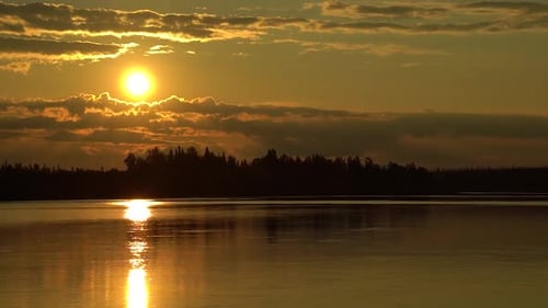 Autumn Yellow Sunset Over Clouds Near Forest with Forest River
