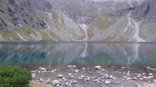 hiking climb high mountain hard steep climb waterfall mountain lake