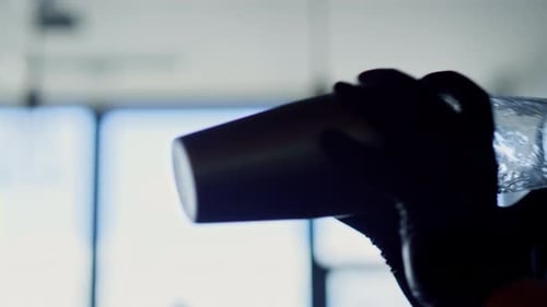 Bartender Mixing a Drink in Cocktail Shaker