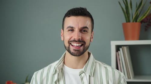 Smiling Young Man Portrait in Casual Indoor Setting