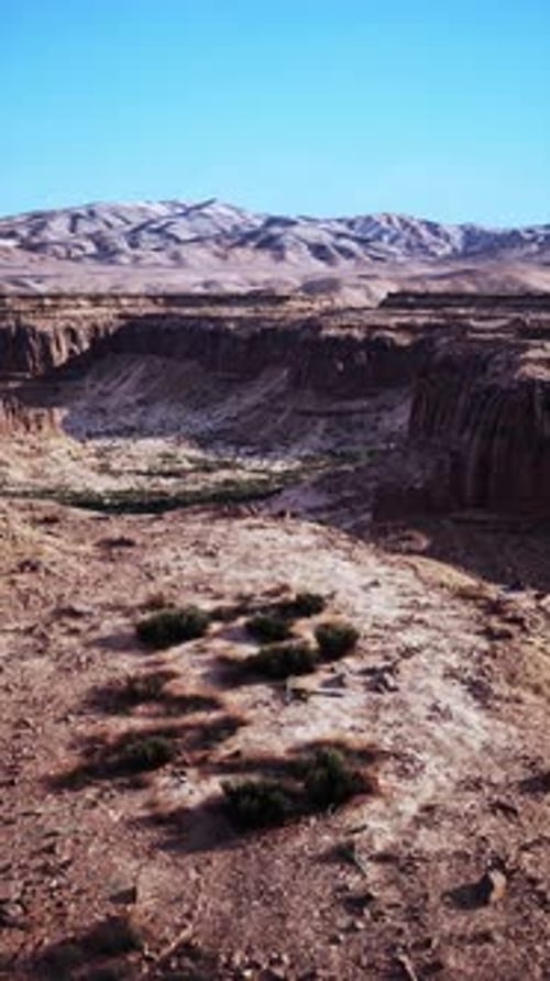 Majestic Canyon With Mountain Range